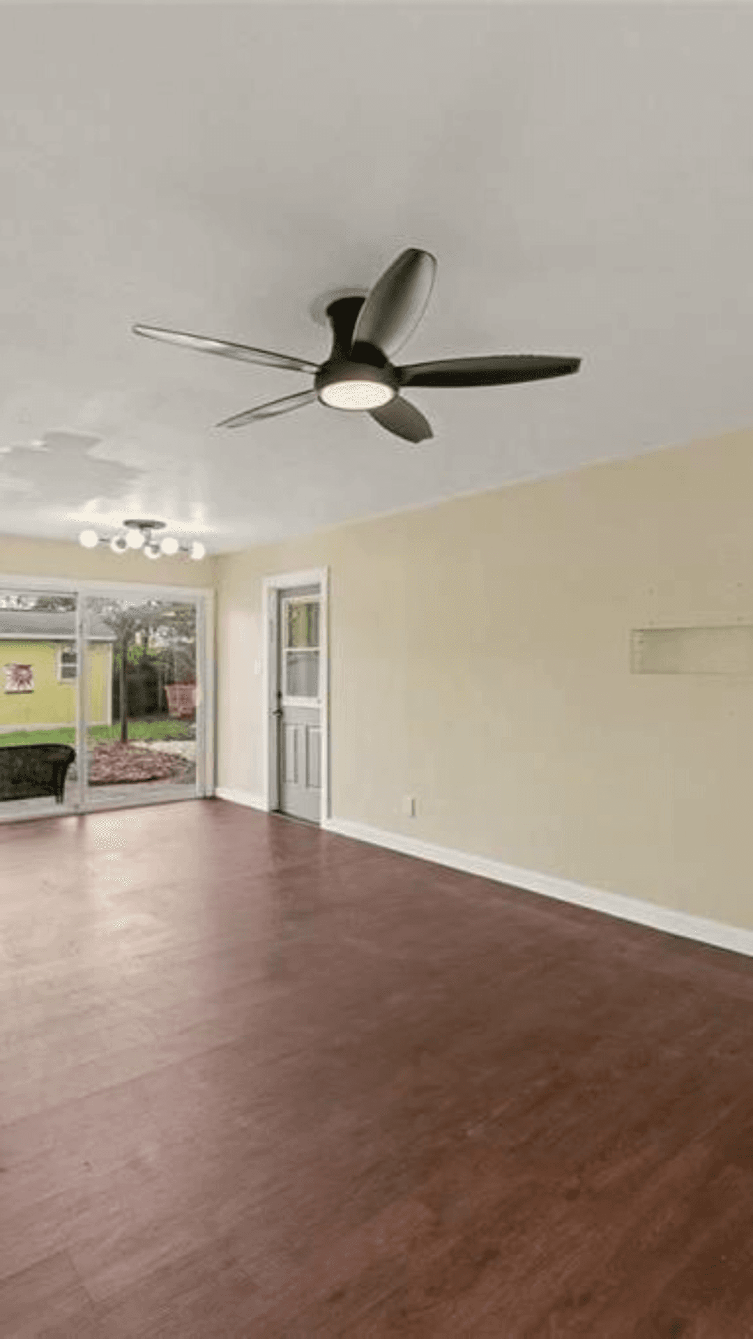 Primary bedroom, original MLS photo versus AI-staged reveal frame — before
